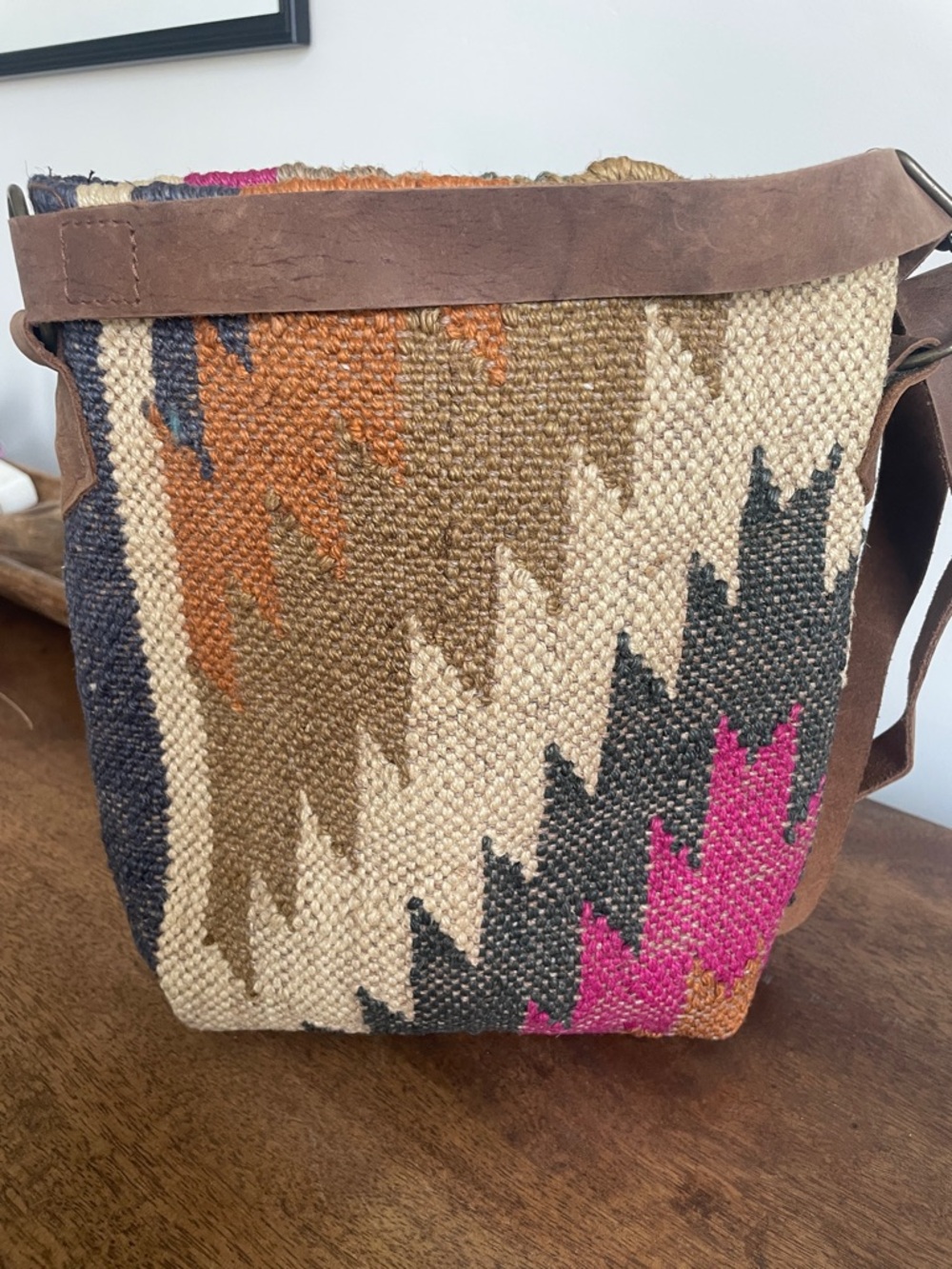 Handwoven Geometric Crossbody Bag with Pink Accent